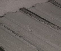 香蕉视频APP污污污砌塊生產線的刮漿裝置